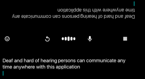 A screenshot of a phone with a black background and white text in landscape at the bottom, and which is repeated upside down at the top.  In the center of these are buttons for replay, volume down and stop.