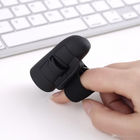 Finger mouse being worn as a ring.