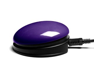 Purple round switch button with cord attached to base.